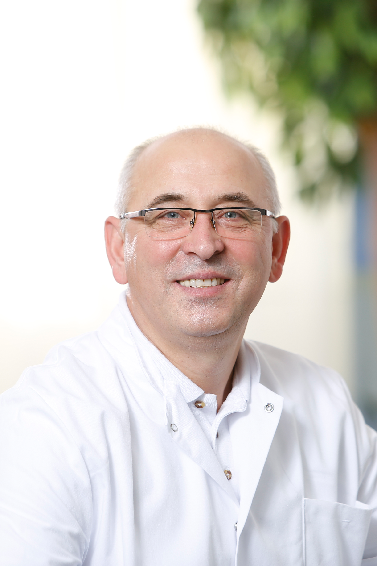 Dr. med. Ilian Nazev